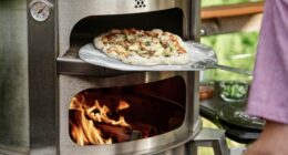 Breeo Pizza Oven and man cooking